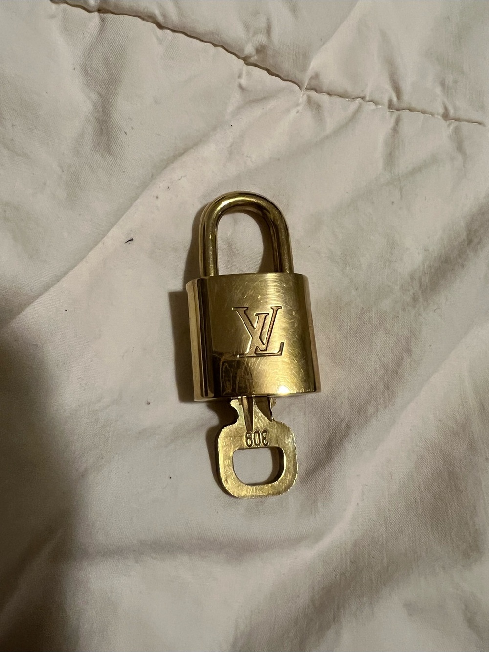 Louis Vuitton Gold Padlock and Key with LV Monogram